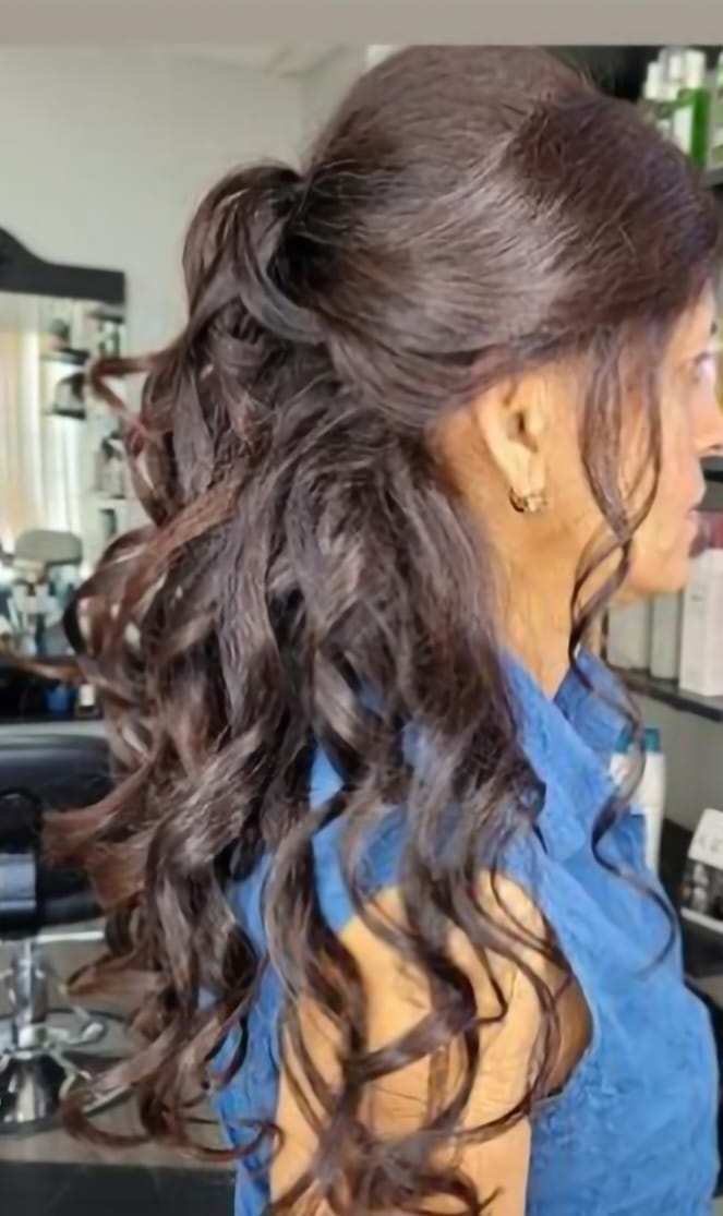 Hair curling and half up - half down hairstyle Sania M Hairstylist, hairdresser based in Guelph.